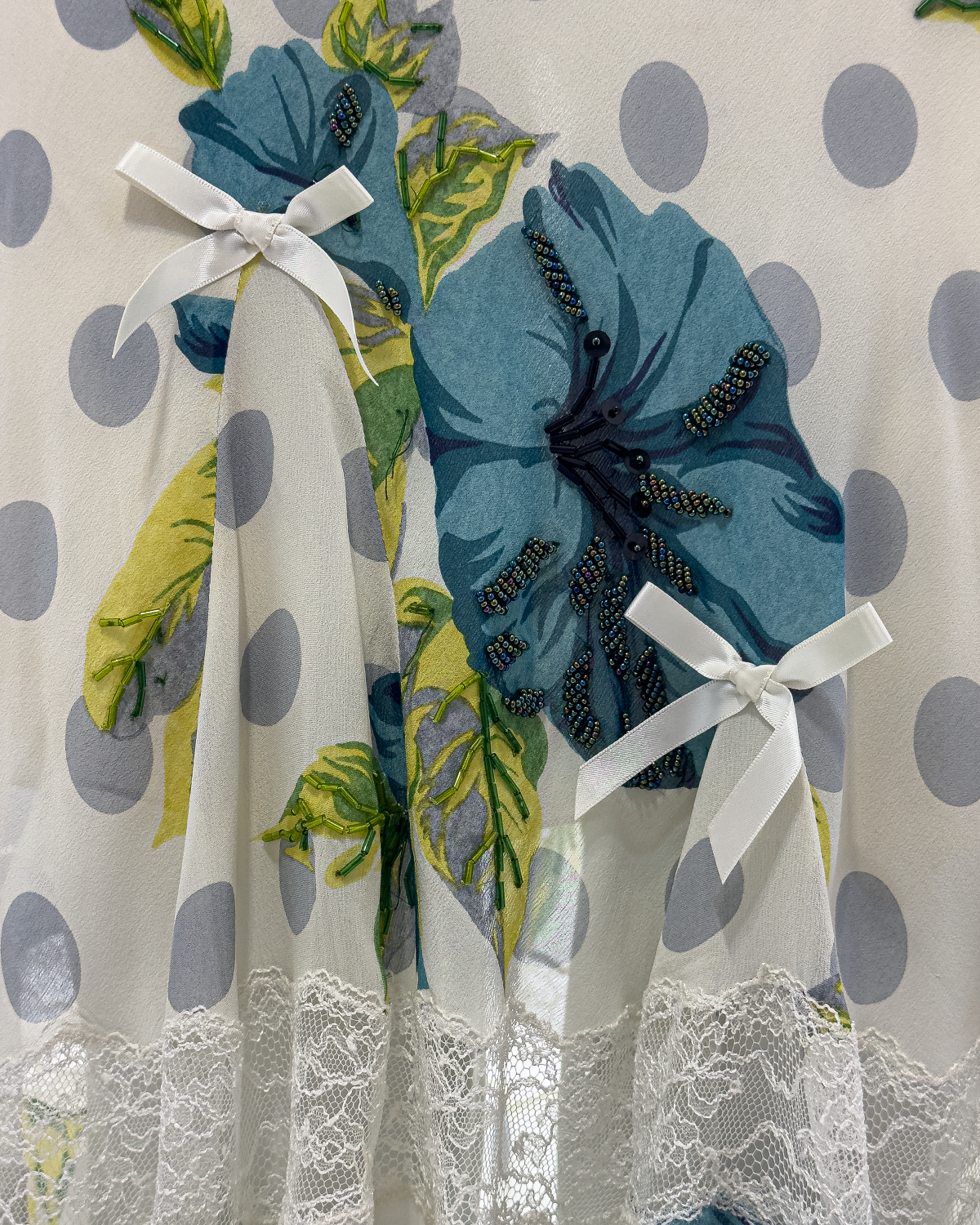 Christian Dior by John Galliano Blue Polka Dotted White Silk Midi Dress with Bows, Lace Details and Sequined Floral Motifs, Spring/Summer 2005